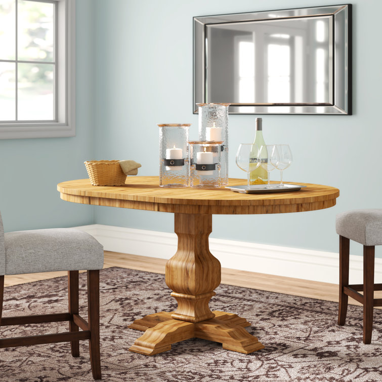 Arisa 60'' Extendable Solid Wood Pedestal Dining Table Arisa 60'' Extendable Solid Wood Pedestal